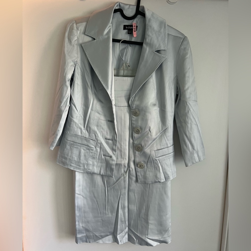 Baby blue Jacket and skirt by le chateau
